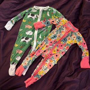 Two pairs of Little Sleepies onesies